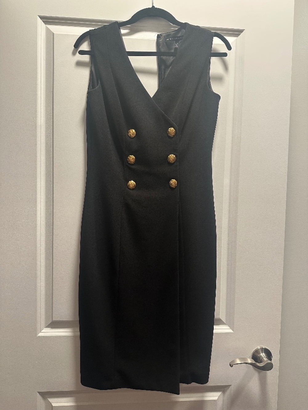 Black dress with detailed buttons